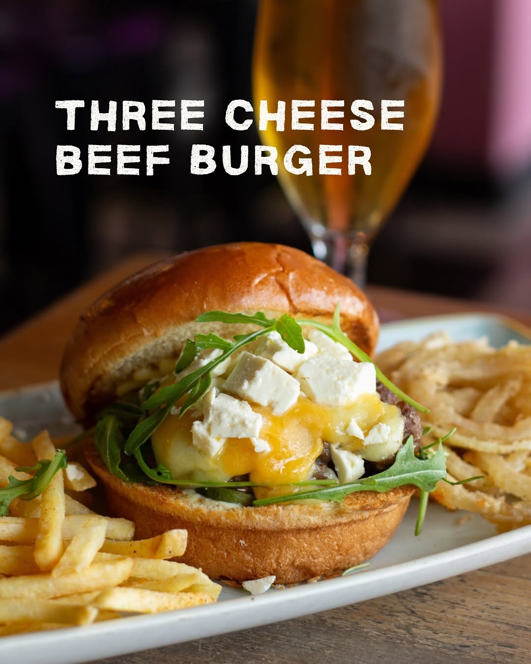 Burger with chips and onion rings at Lekker Kalk Bay